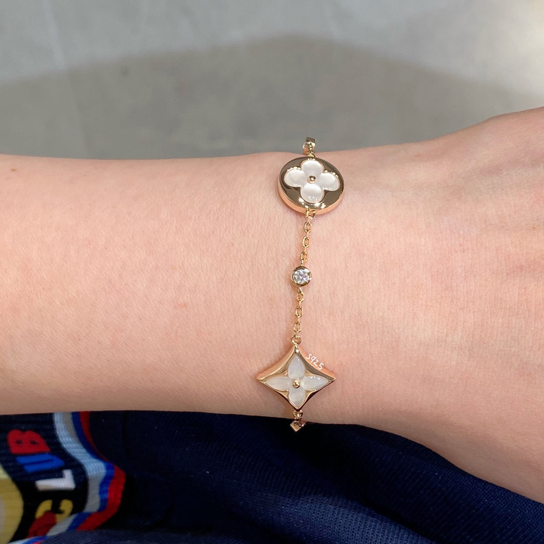 [CiCi]STAR AND SUN 4 MOTIF WHITE MOP PINK GOLD BRACELET