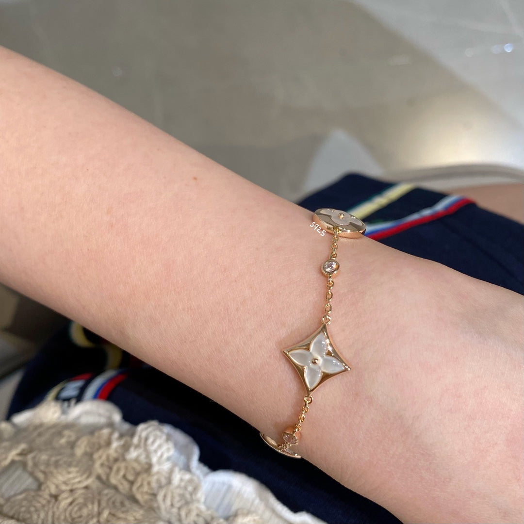 [CiCi]STAR AND SUN 4 MOTIF WHITE MOP PINK GOLD BRACELET